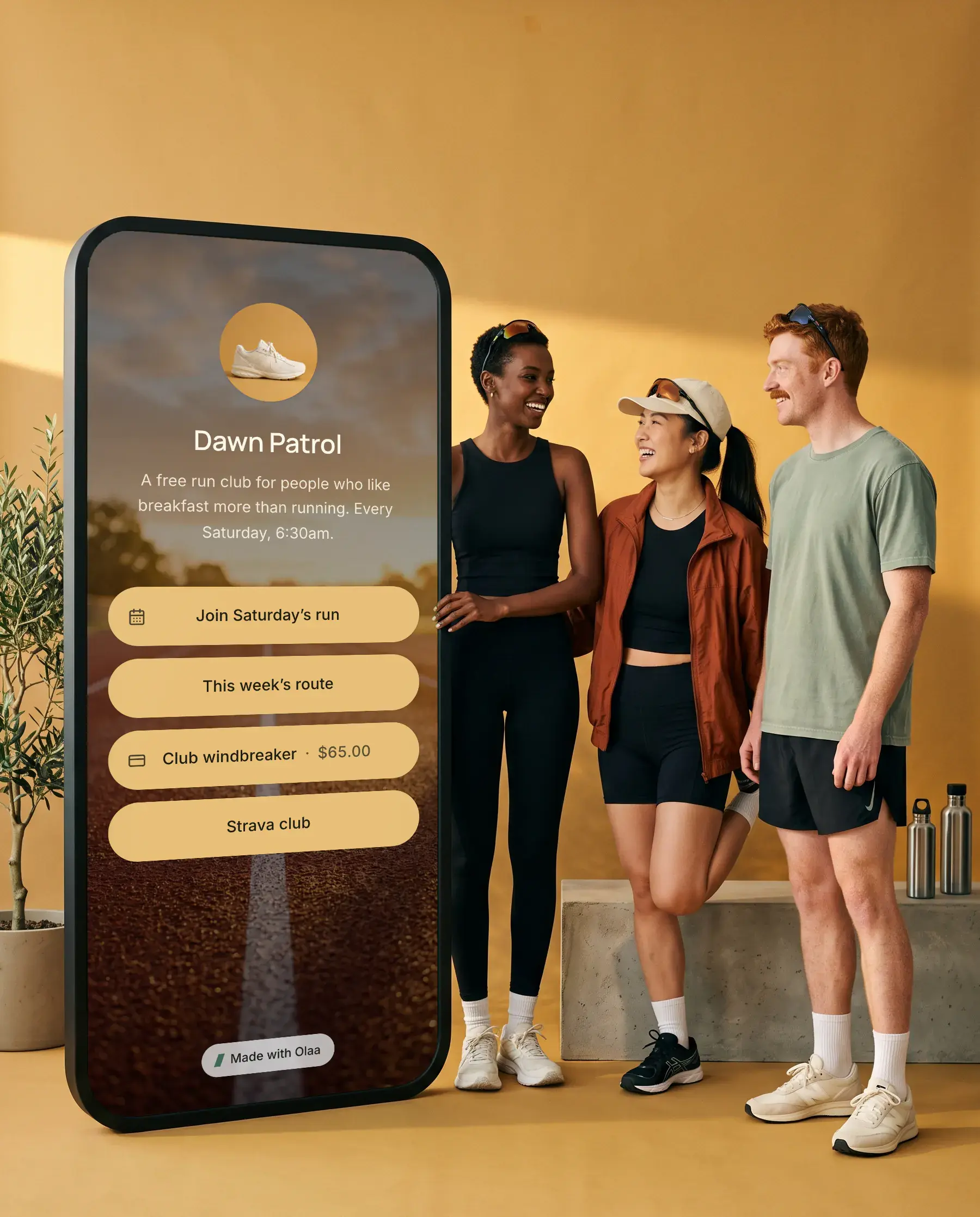 The Dawn Patrol run club beside a giant phone showing their Olaa page